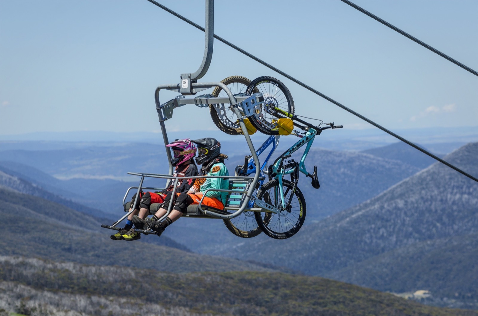 Mountain bikers and their bikes riding the chairlift